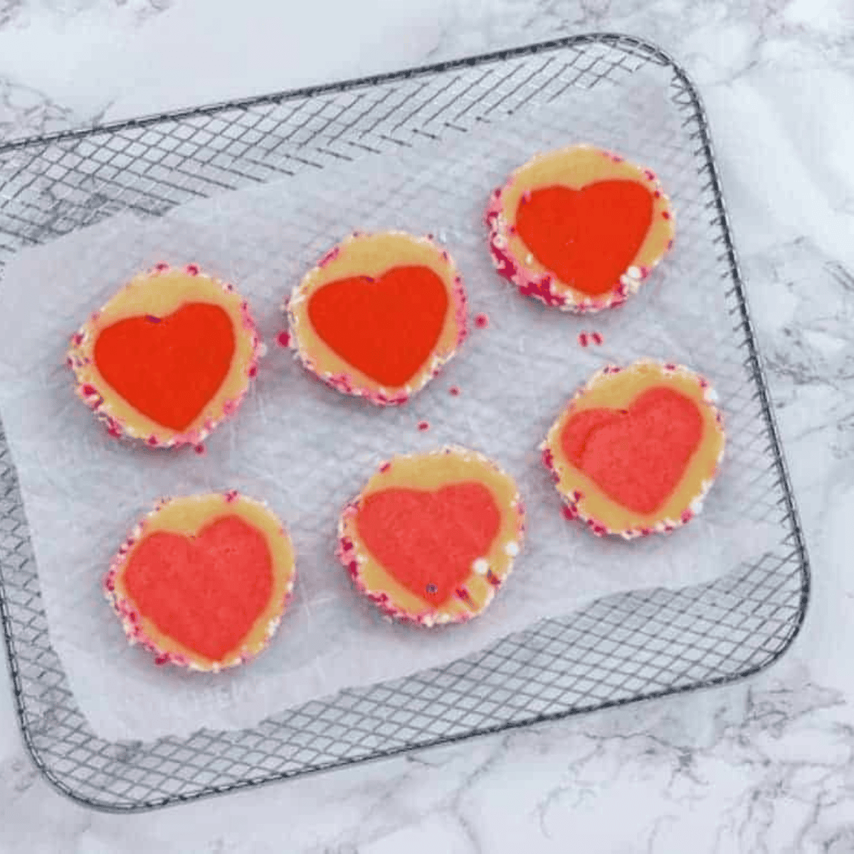 Buttery and colorful holiday slice-and-bake cookies baked in an air fryer.