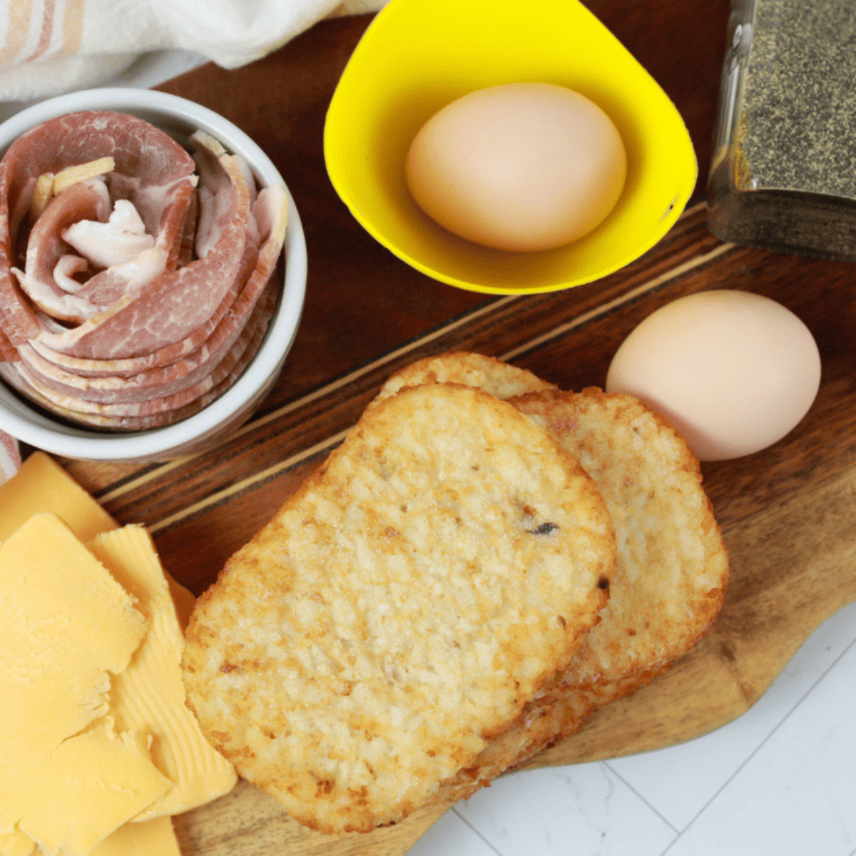Ingredients needed for Frozen Hash Browns in Air Fryer (Crispy in 10 Minutes — Any Brand!) on kitchen table.
