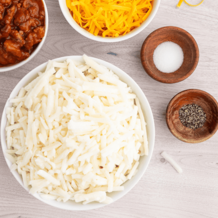 Ingredients needed for Shredded Hash Browns in Air Fryer (Crispy Diner-Style — Ready in 18 Minutes!) on kitchen table.