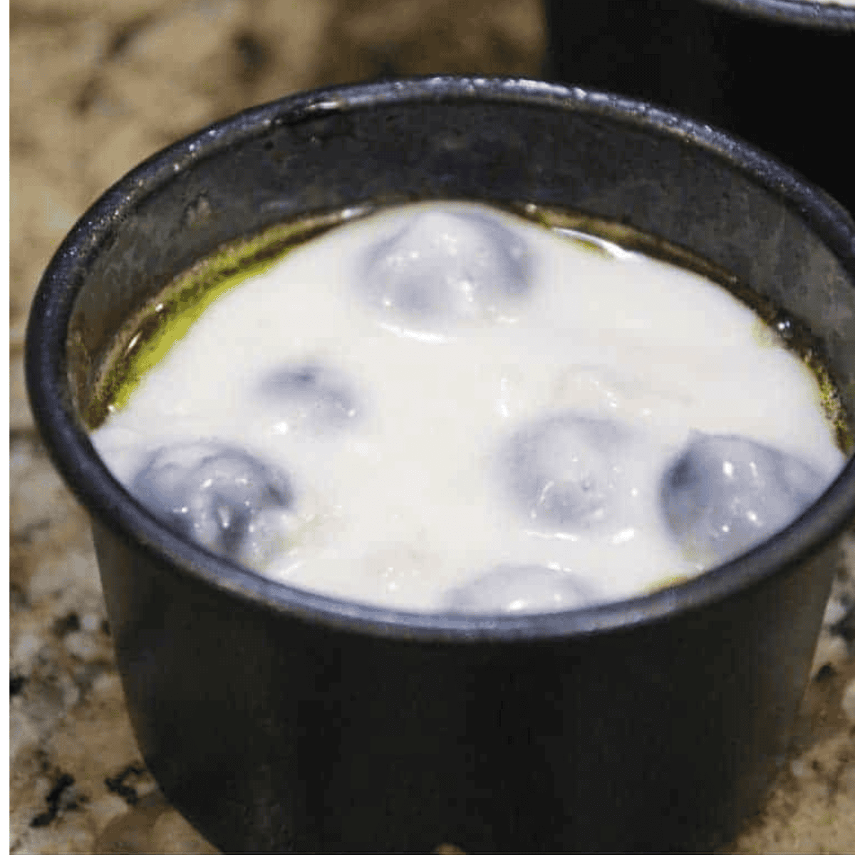 Prepare muffin tins or silicone liners with cooking spray, fill two-thirds full, and place in air fryer at 320 degrees F for 6 to 9 minutes.