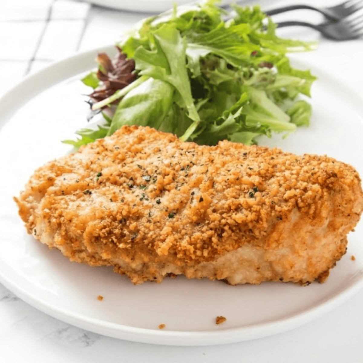 Crispy Air Fryer Shake and Bake Chicken pieces on a plate
