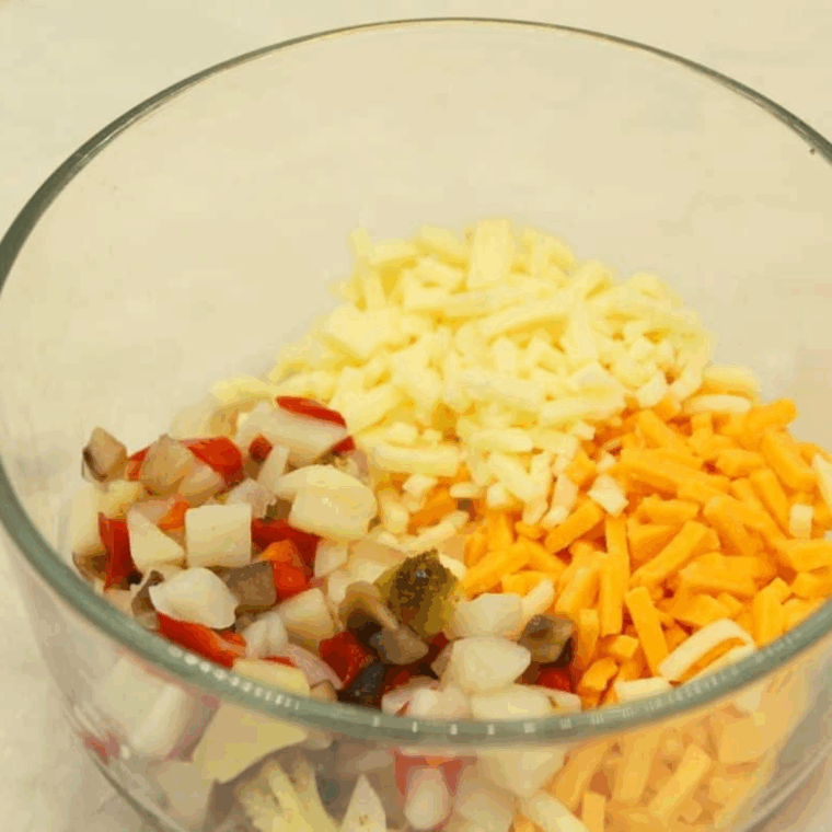Ingredients needed for Air Fryer Veggie Egg Bites on kitchen table.