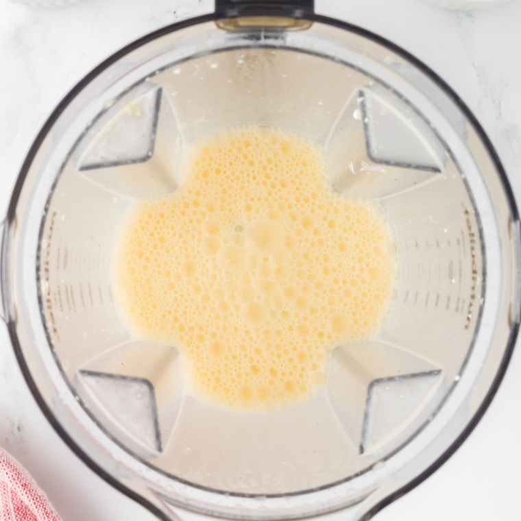 Eggs, heavy cream, salt and pepper whisked gently into the cheese and vegetable mixture until just uniform