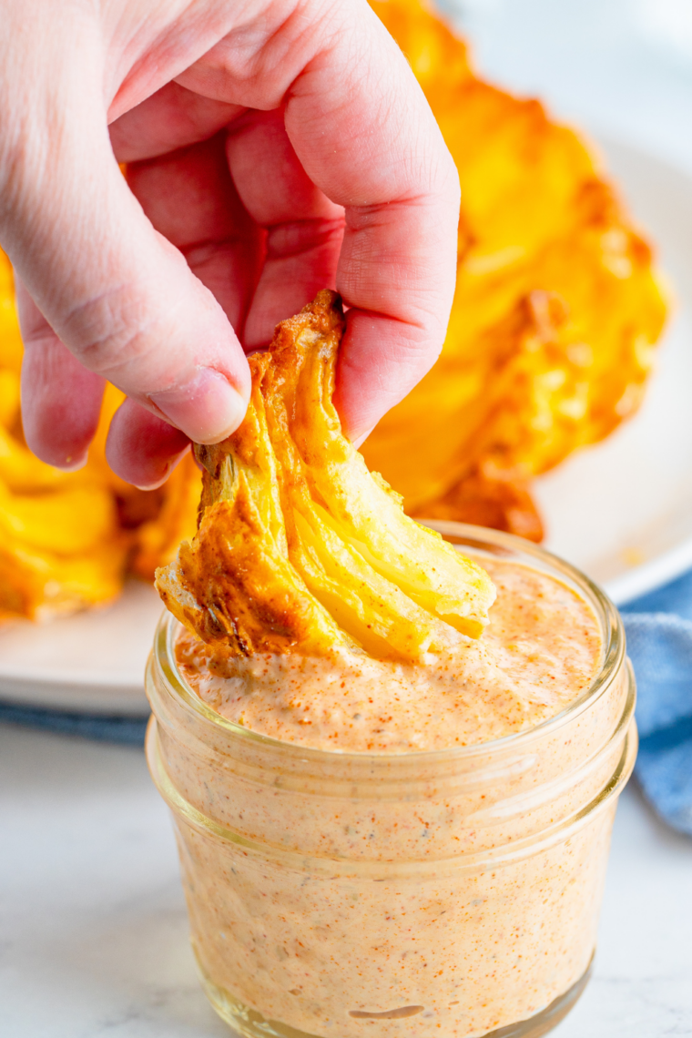 Homemade bloomin' onion dipping sauce served in a small bowl
