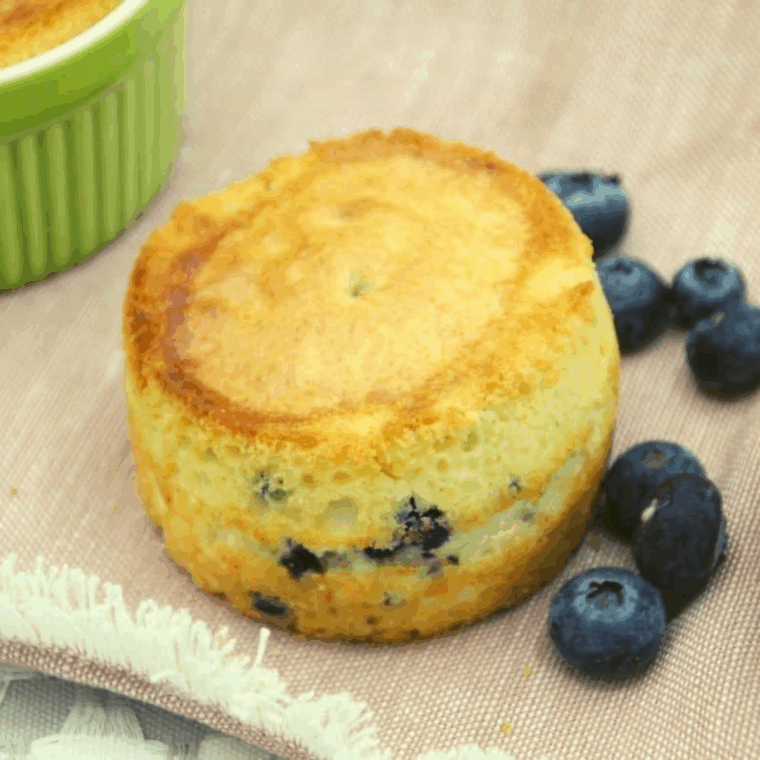 Golden air fryer Martha White muffins with soft, fluffy centers, freshly baked and ready to enjoy.