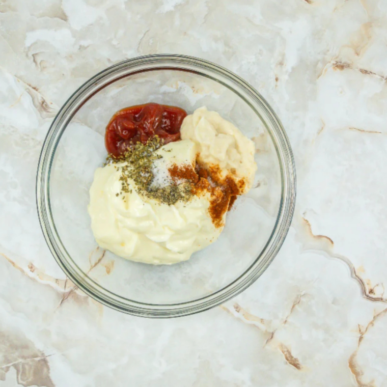 Whisking Outback bloomin' onion sauce ingredients into a smooth, evenly blended dip