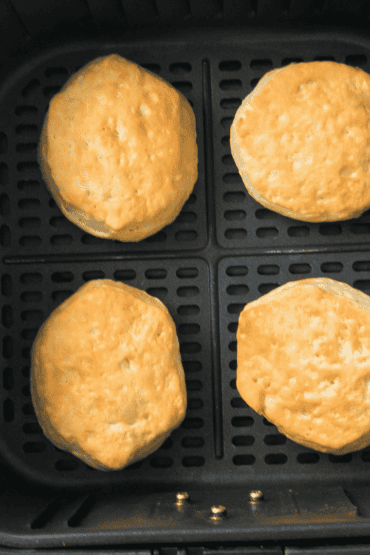 Air fryer display set to 330Β°F (165Β°C), highlighting the correct lower temperature for evenly cooking canned biscuits without burning the outside.