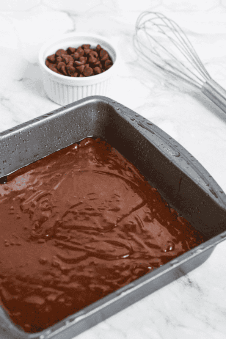Pouring brownie batter into a greased pan, baking in air fryer at 320°F for 18–22 minutes, then cooling freshly baked brownies before serving.