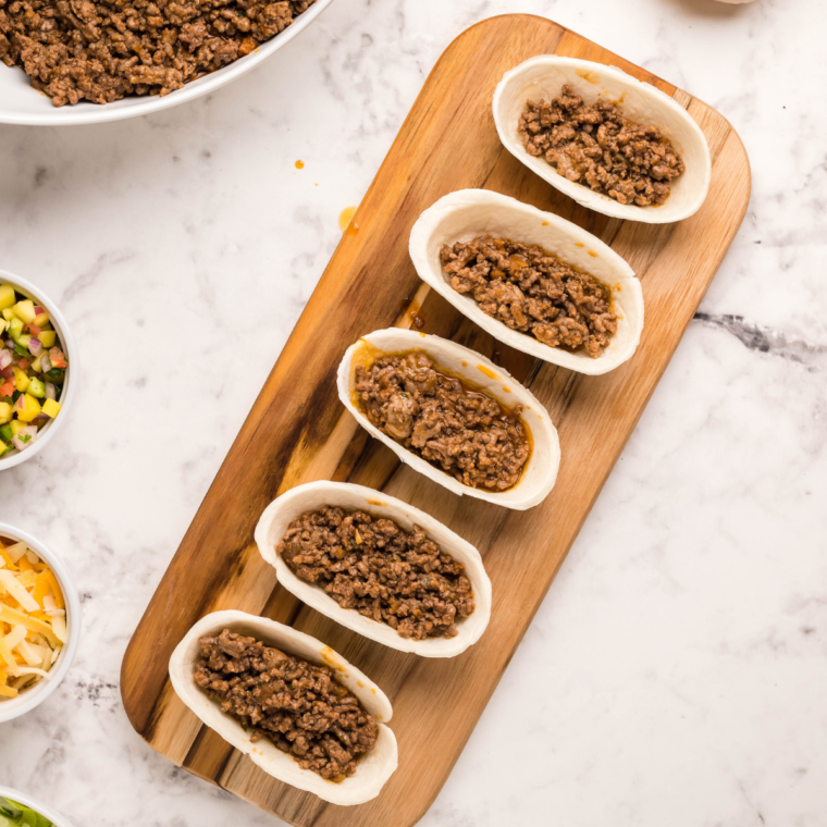 Air fryer preheating to 390°F to make crispy mini taco boats
