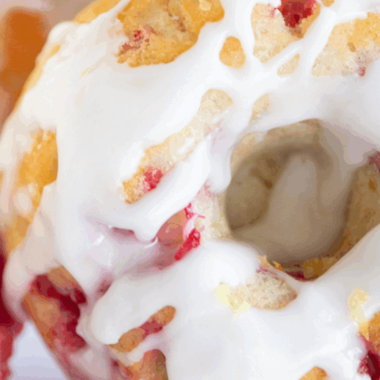 Plate of air fryer raspberry lemon donuts with glaze