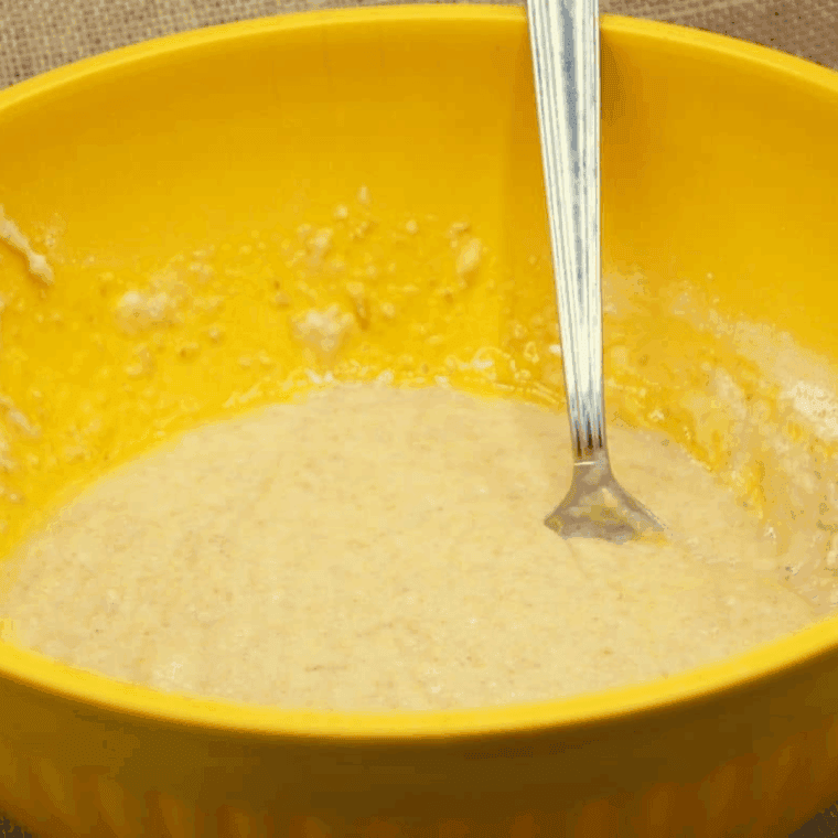 Mixing Trader Joe’s banana bread mix with eggs, oil, and water