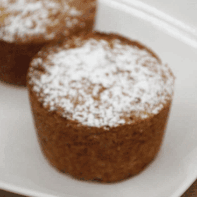 Plate of Air Fryer Trader Joe's Banana Bread Muffins on kitchen table.