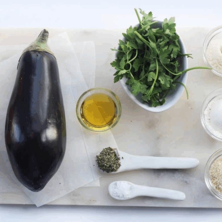 Ingredients needed for Extra-Crispy Gluten-Free Air Fryer Eggplant Parmesan on kitchen table.
