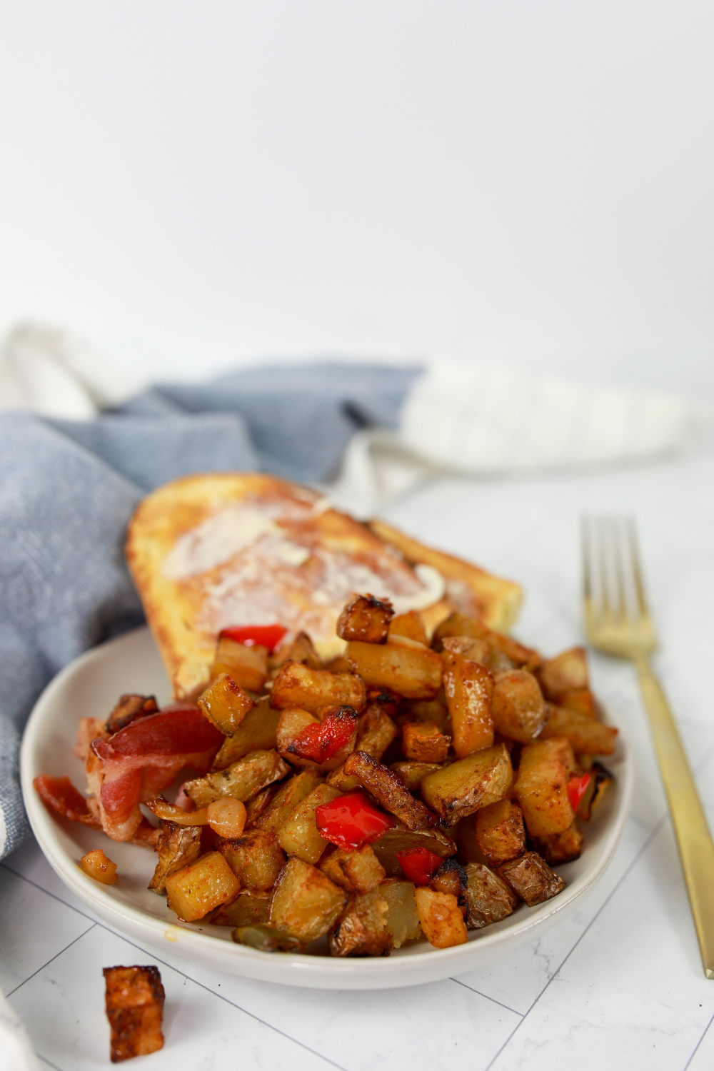 crispy air fryer breakfast potatoes golden brown with diced seasoning