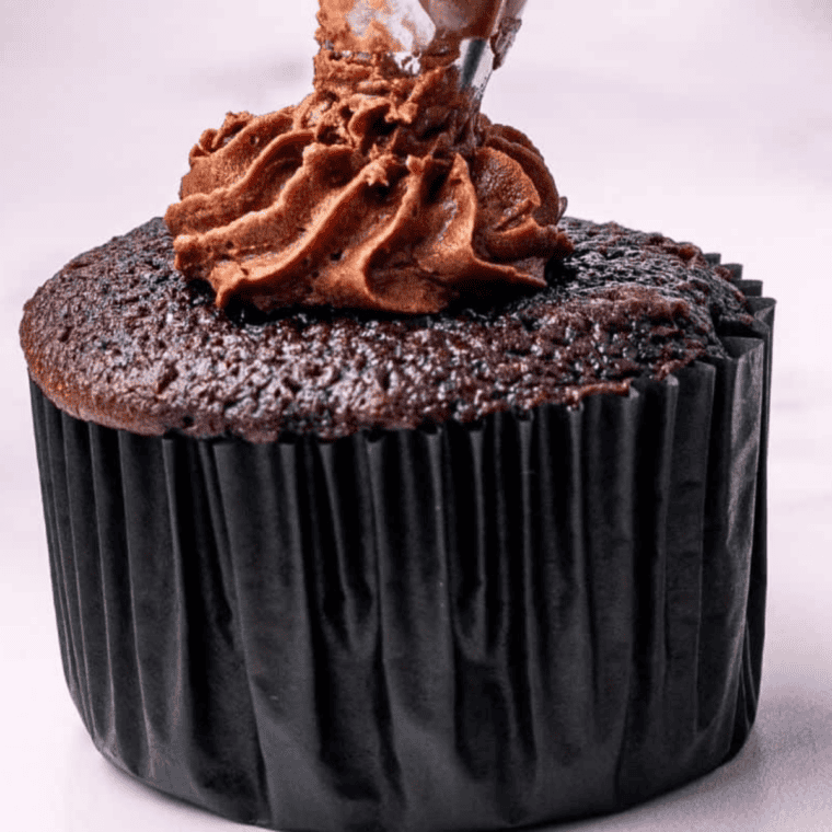 Moist air fryer chocolate cupcakes with soft centers and rich chocolate flavor.