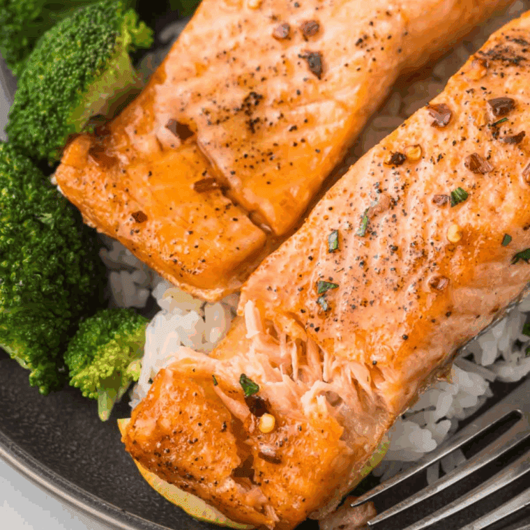 Air fryer maple glazed salmon fillets with caramelized edges and flaky texture