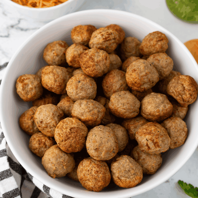 Ingredients needed for Easy Instant Pot Meatball Subs Recipe  on kitchen table.