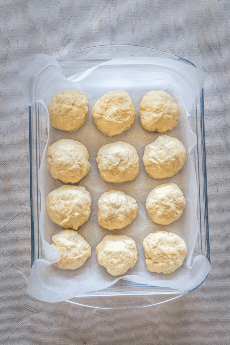 Golden, fluffy sourdough discard dinner rolls freshly baked and ready to serve