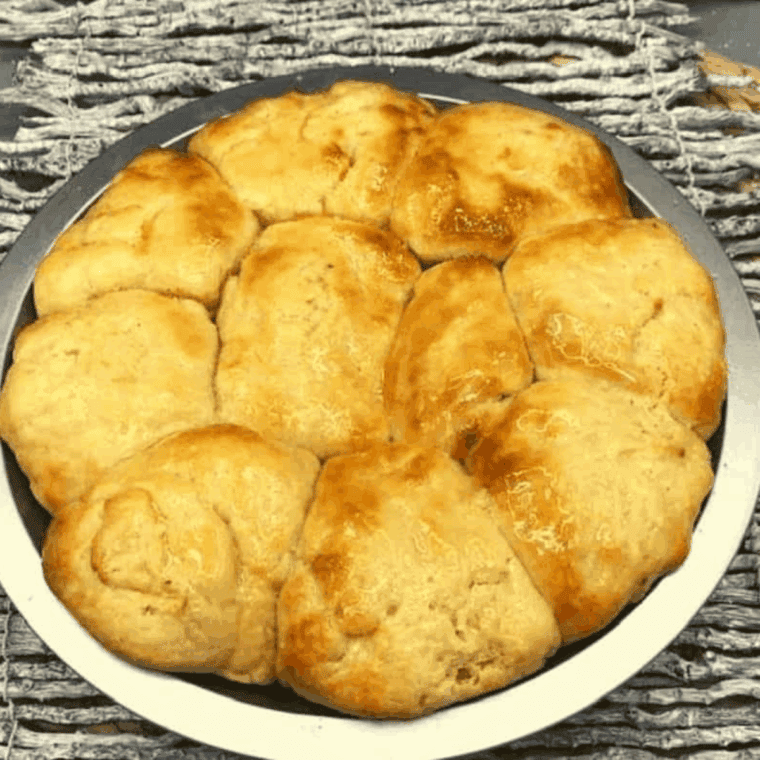 golden brown Parker House rolls (Sister Schubert Style) in a serving basket