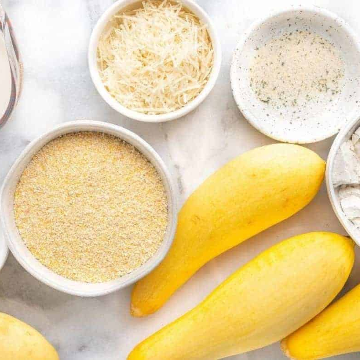 Yellow squash, flour, milk, cornmeal, Parmesan, and garlic salt for fried squash