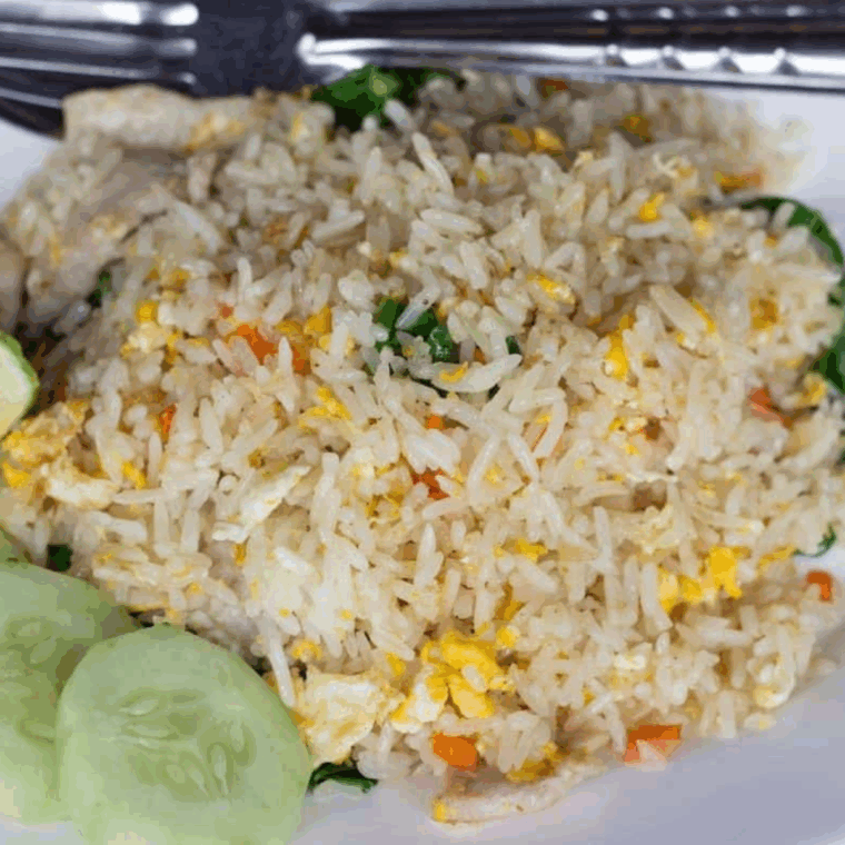 Instant Pot Pork Fried Rice served in a bowl with vegetables