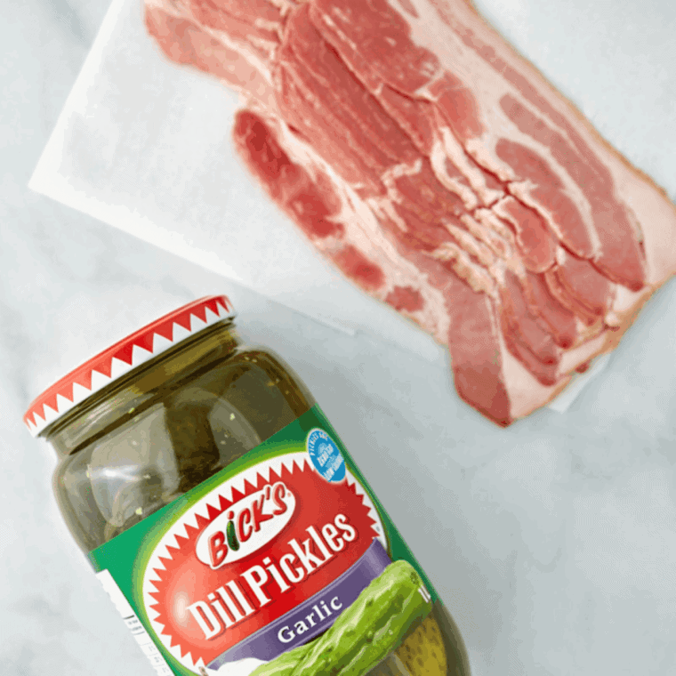 Ingredients needed for Bacon Wrapped Pickles In Air Fryer on kitchen table.