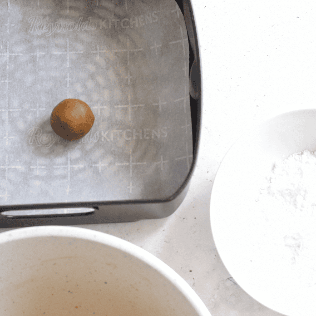 Air frying gingersnap cookies at 320°F for 5–7 minutes until edges set and cookies firm as they cool.
