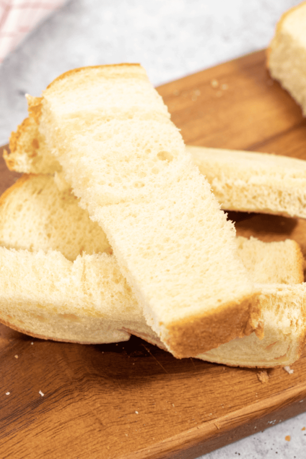 Bread slices cut into thick even French toast sticks