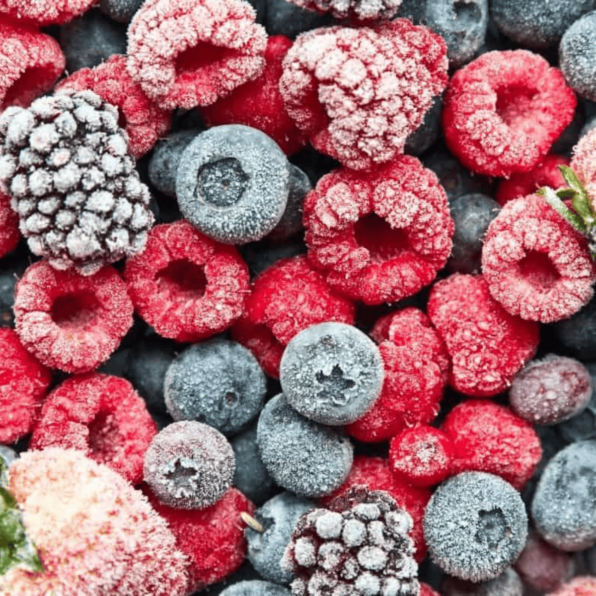 Jar of homemade Instant Pot Mixed Berry Jam made with fresh mixed berries and no pectin.