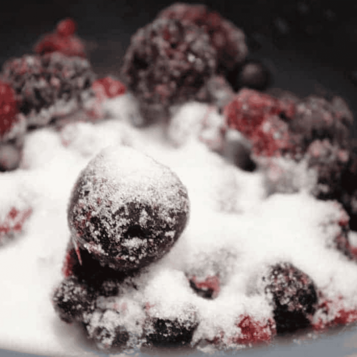 Frozen mixed berries, sugar, and lemon juice added to the Instant Pot