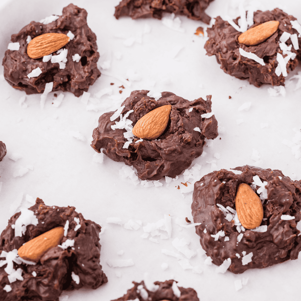 Almond Joy candy bar cut open to show coconut, chocolate, and a whole roasted almond