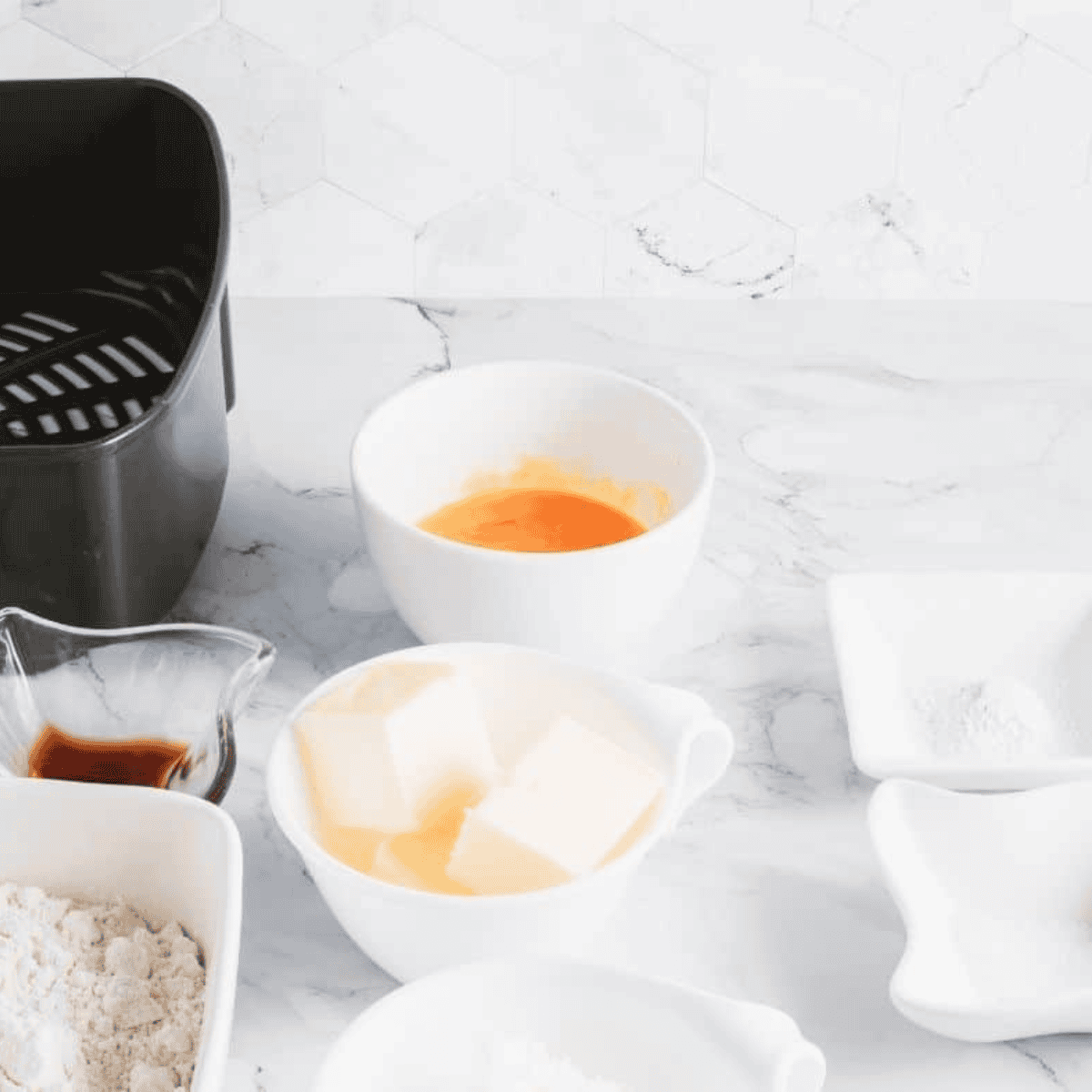 Ingredients needed for 3-Ingredient Air Fryer Shortbread Cookies on kitchen table.