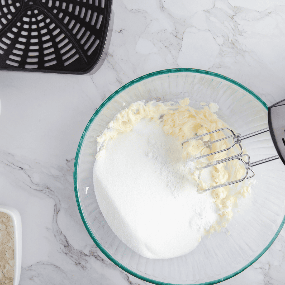 Air fryer basket lined with parchment paper and lightly sprayed with cooking spray.