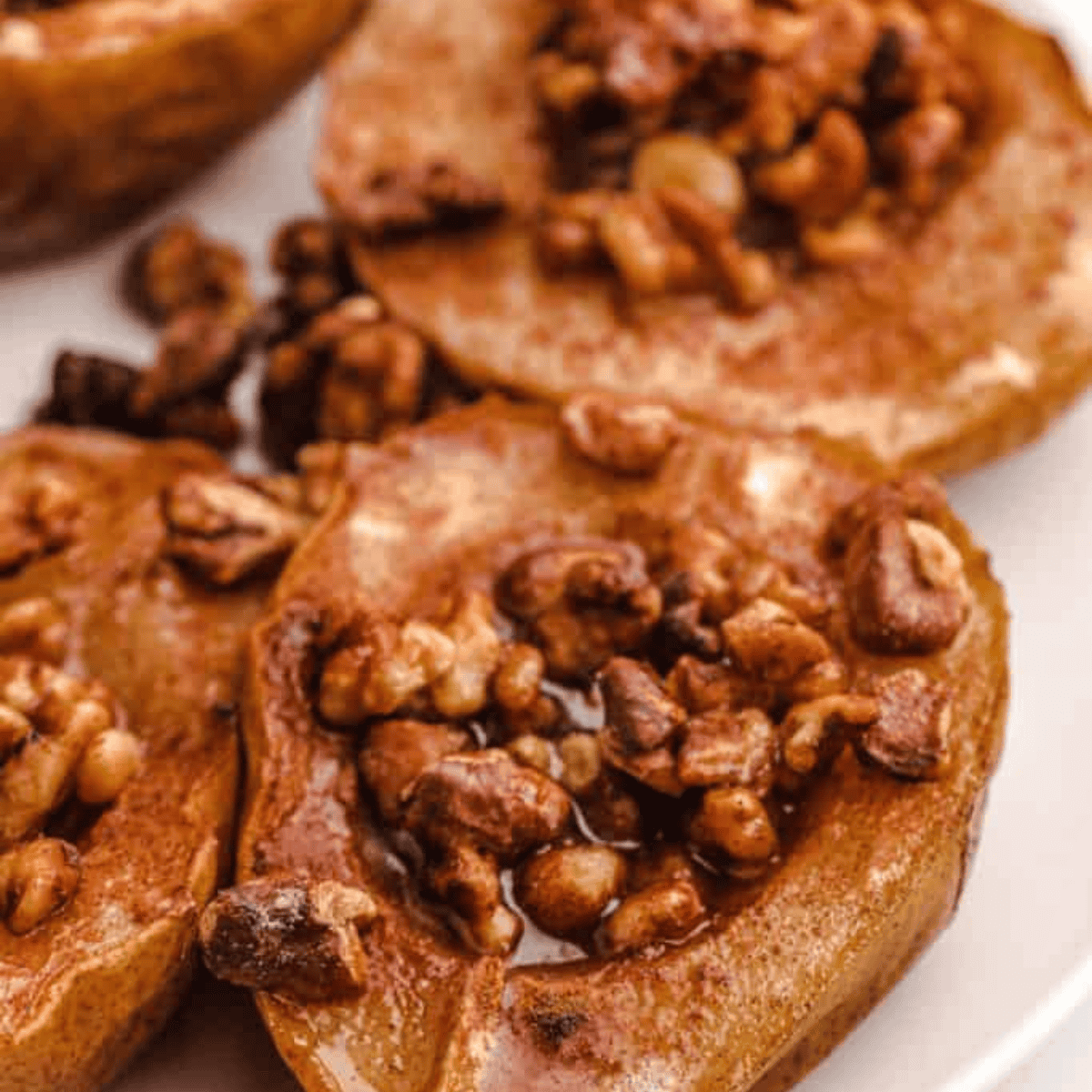 Warm air fryer baked pears drizzled with honey and served fresh with a caramelized topping.