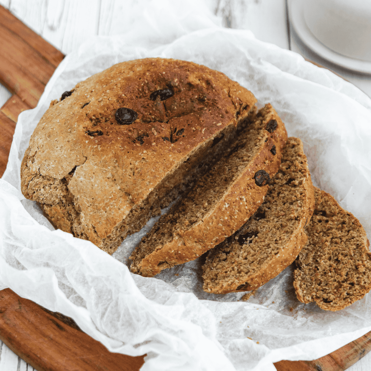 Finished air fryer Boston brown bread cooling before being sliced into pieces