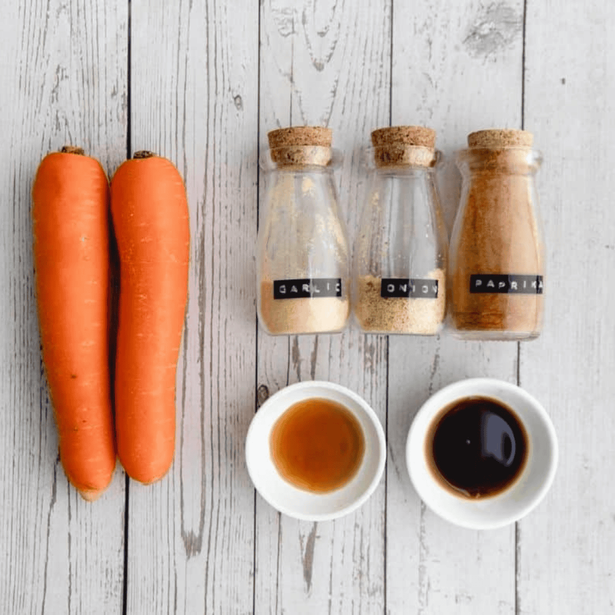 Ingredients for air fryer carrot bacon: carrots, maple syrup, soy sauce and spices