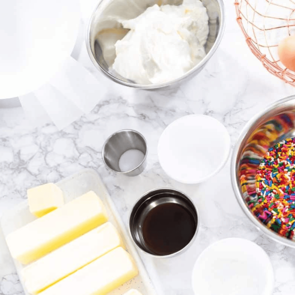 Ingredients needed for Easy Air Fryer Funfetti Cake on kitchen table.
