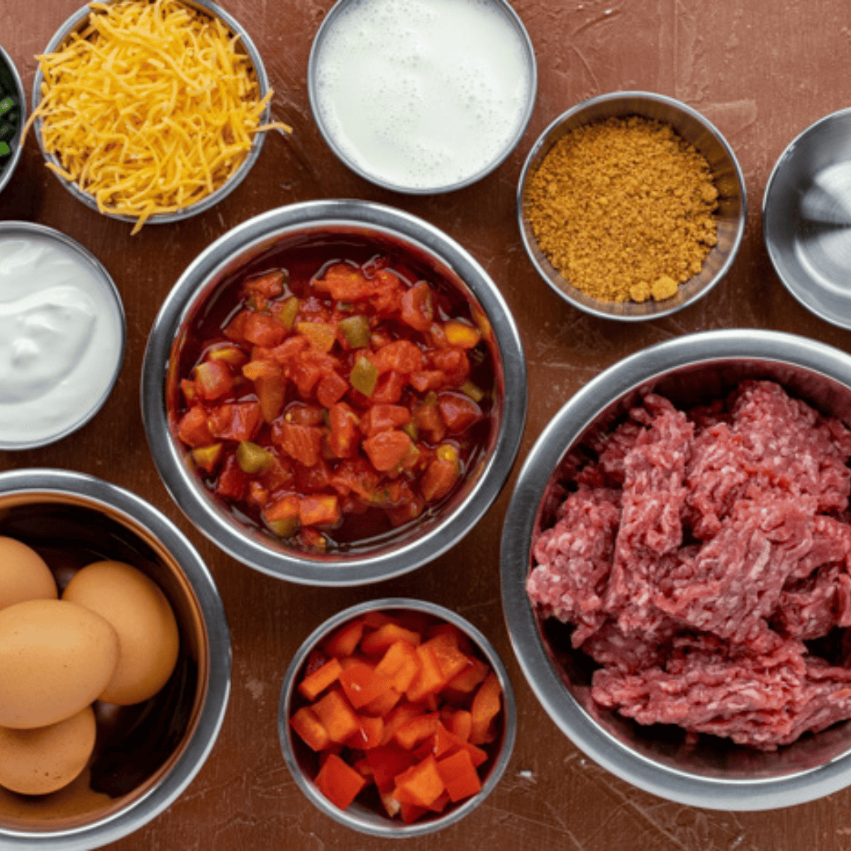 Ingredients needed for Air Fryer Sloppy Joe Cups on kitchen table.