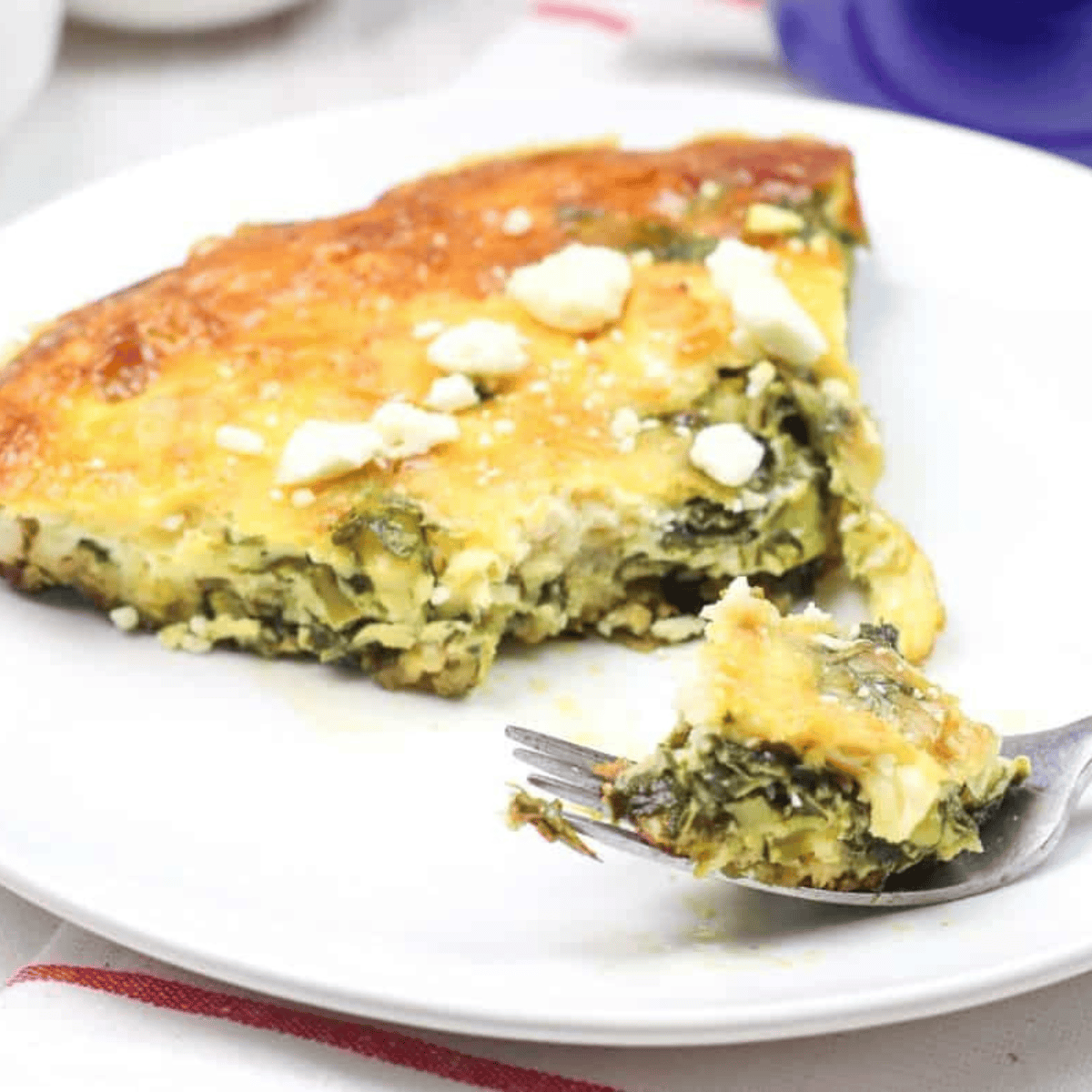 Air fryer asparagus spinach cheese frittata sliced and served warm