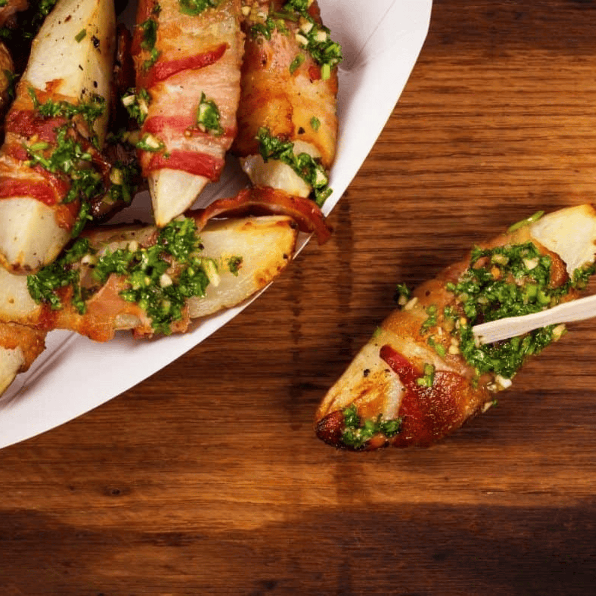 Air fryer bacon wrapped potato wedges cooked until crispy and golden brown