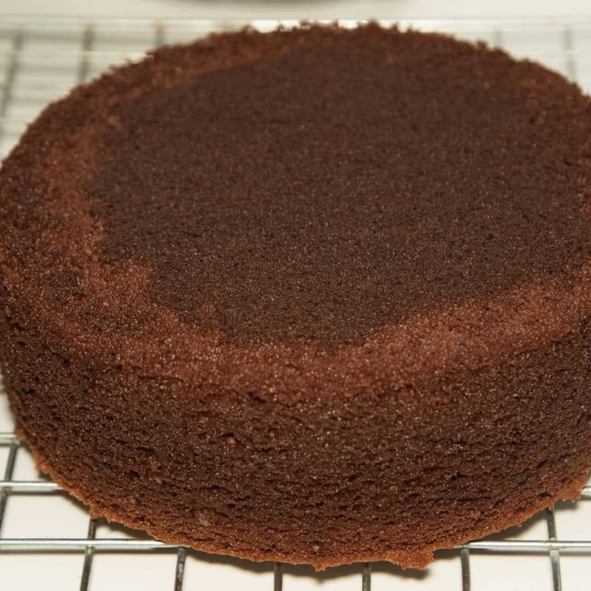 Cooling air fryer chocolate cakes and trimming domed tops before freezing