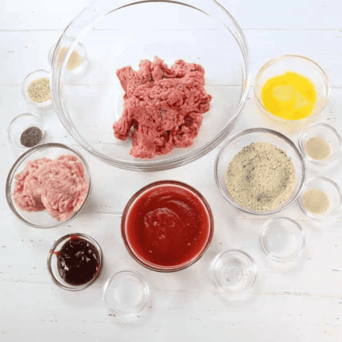 Ingredients for copycat Boston Market meatloaf: ground beef, ground pork, breadcrumbs, egg, tomato sauce and BBQ sauce