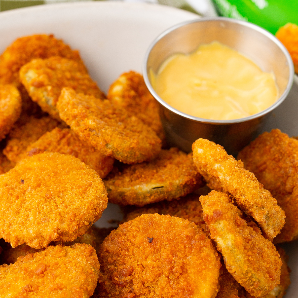 Small bowl of creamy golden honey mustard sauce