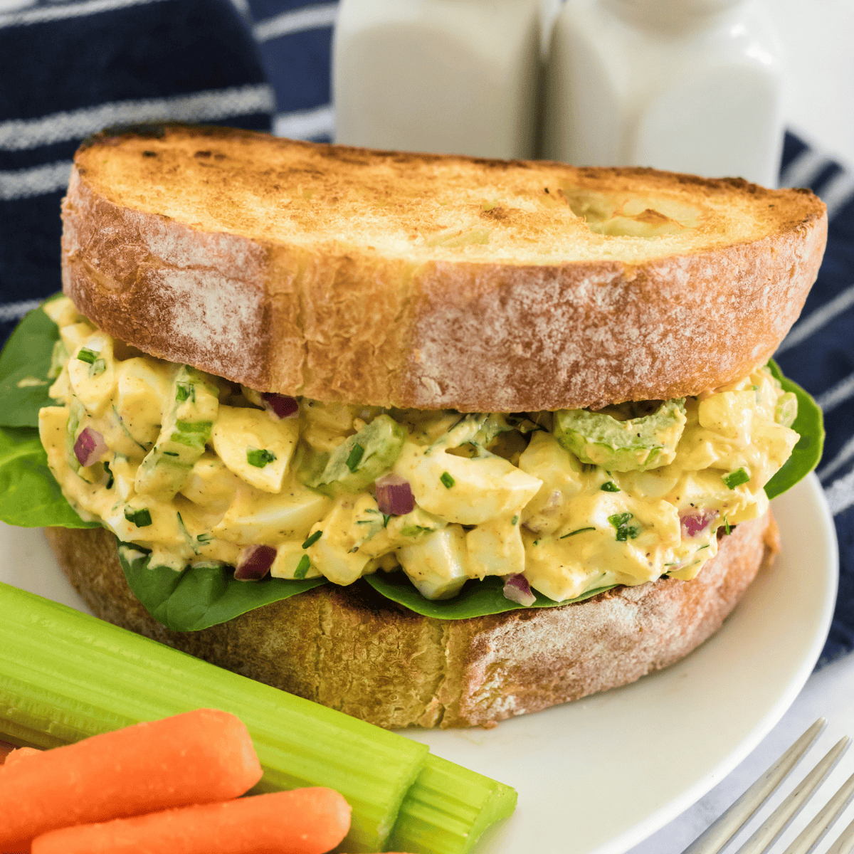 Homemade Copycat Starbucks Egg Salad Sandwich with creamy egg filling on soft bread