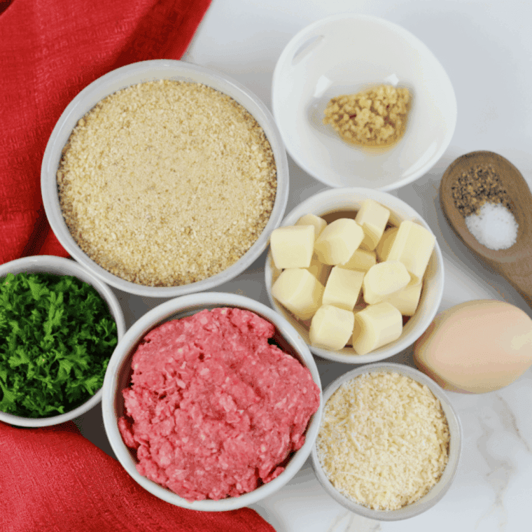 Ingredients needed for Maggiano’s Meatball Recipe (Copycat) on kitchen table.