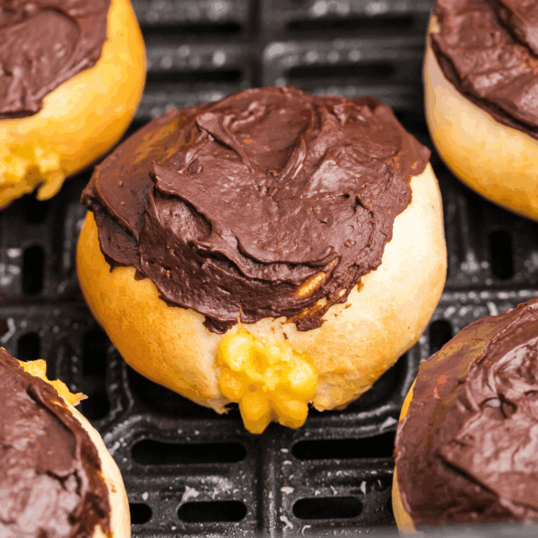 Air fryer Bavarian cream donuts filled with vanilla custard and dusted with powdered sugar