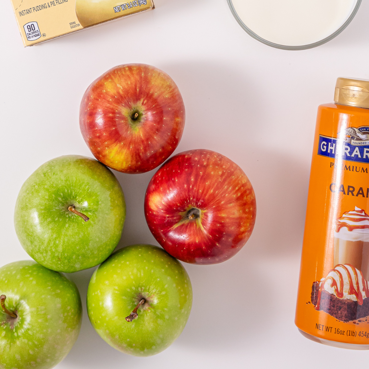 Ingredients needed for Air Fryer Apple Cinnamon Bacon Bites on kitchen table.