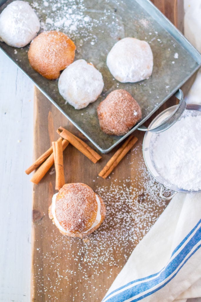 dding variations to your Air Fryer Doughnut Holes can transform them into an array of delightful treats, each offering a unique flavor and experience. Here are some creative ideas: Chocolate Glazed Doughnut Holes: After they're air-fried, dip the doughnut holes in a chocolate glaze made from melted chocolate and a bit of cream. You can even sprinkle some colorful sprinkles on top for a fun touch. Cinnamon Sugar Doughnut Holes: Roll the warm doughnut holes in a mix of cinnamon and sugar for a classic and irresistible flavor. Lemon Glazed Doughnut Holes: Create a tangy lemon glaze with powdered sugar and fresh lemon juice. This adds a bright, citrusy flavor, perfect for a refreshing twist. Powdered Sugar Snowballs: Simply dusting the doughnut holes with powdered sugar can give them a delightful snowy appearance and a sweet, soft finish. Filled Doughnut Holes: After they’re cooked, use a piping bag to fill the doughnut holes with jelly, custard, or Nutella for a sweet surprise in every bite. Maple Glazed Doughnut Holes: Combine powdered sugar with maple syrup to make a glaze that brings a hint of autumn to your treat. Vanilla Glazed Doughnut Holes: A simple vanilla glaze made with powdered sugar, milk, and vanilla extract can add a classic and delightful sweetness. Pumpkin Spice Doughnut Holes: Incorporate pumpkin puree and pumpkin spice into your dough for a fall-inspired treat, then finish with a simple sugar glaze. Espresso Doughnut Holes: For coffee lovers, add a teaspoon of espresso powder into your dough mix, and finish with a coffee-infused glaze. Almond Joy Doughnut Holes: After glazing, sprinkle shredded coconut and chopped almonds on top for a treat that’s reminiscent of the popular candy bar. These variations on Air Fryer Doughnut Holes offer endless possibilities for enjoying this classic treat. Whether you’re in the mood for something chocolatey, fruity, or classically sweet, there’s a version for every taste.