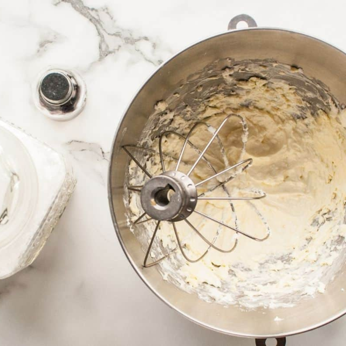 Butter and sugar creamed together in a mixing bowl for pumpkin cake batter