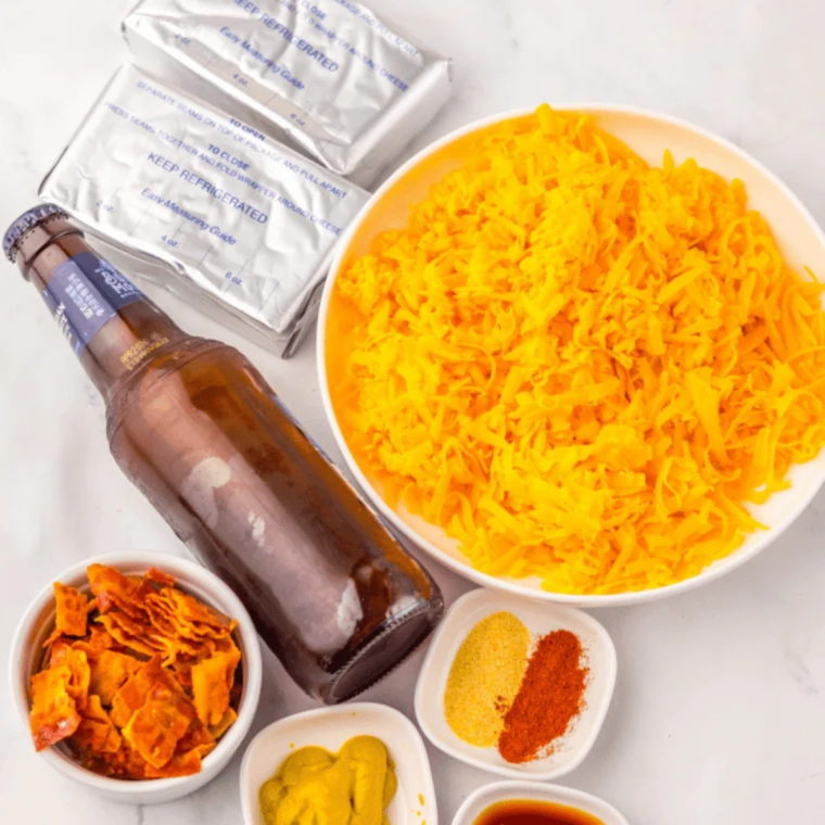 Ingredients for copycat Brew Pub Pretzels and beer cheese dip laid out on a counter